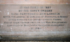 The additional inscription recording the later movements of the plaques.